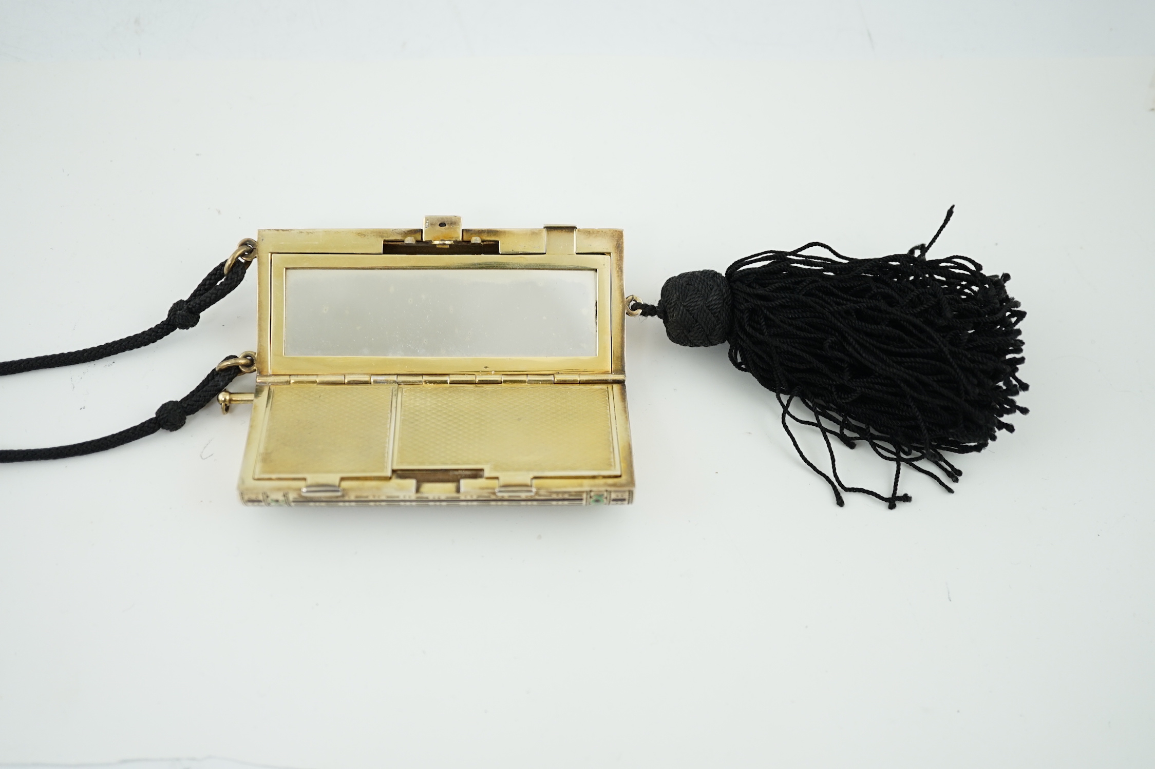 A lady's 1920's silver gilt and two colour enamel combination compact/aide memoir, import marks for Cohen & Charles